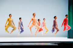 The seven dancers of Pam Tanowitz Dance in mid-air in Pastoral. Photo by Maria Baranova